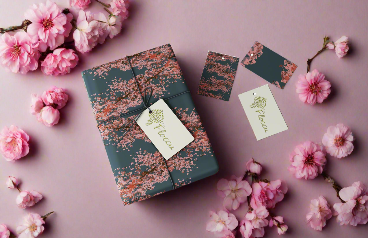 Gift box with floral pattern and matching tags on a white background